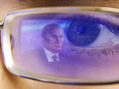 Путин, отражение. Источник - rbc.ru