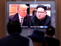 Д.Трамп и Ким Чен Ын в южнокорейских теленовостях. Фото: gettyimages.com