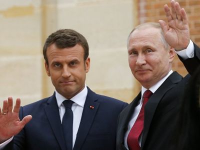 Эммануэль Макрон и Владимир Путин. Фото: Alexander Zemlianichenko / REUTERS